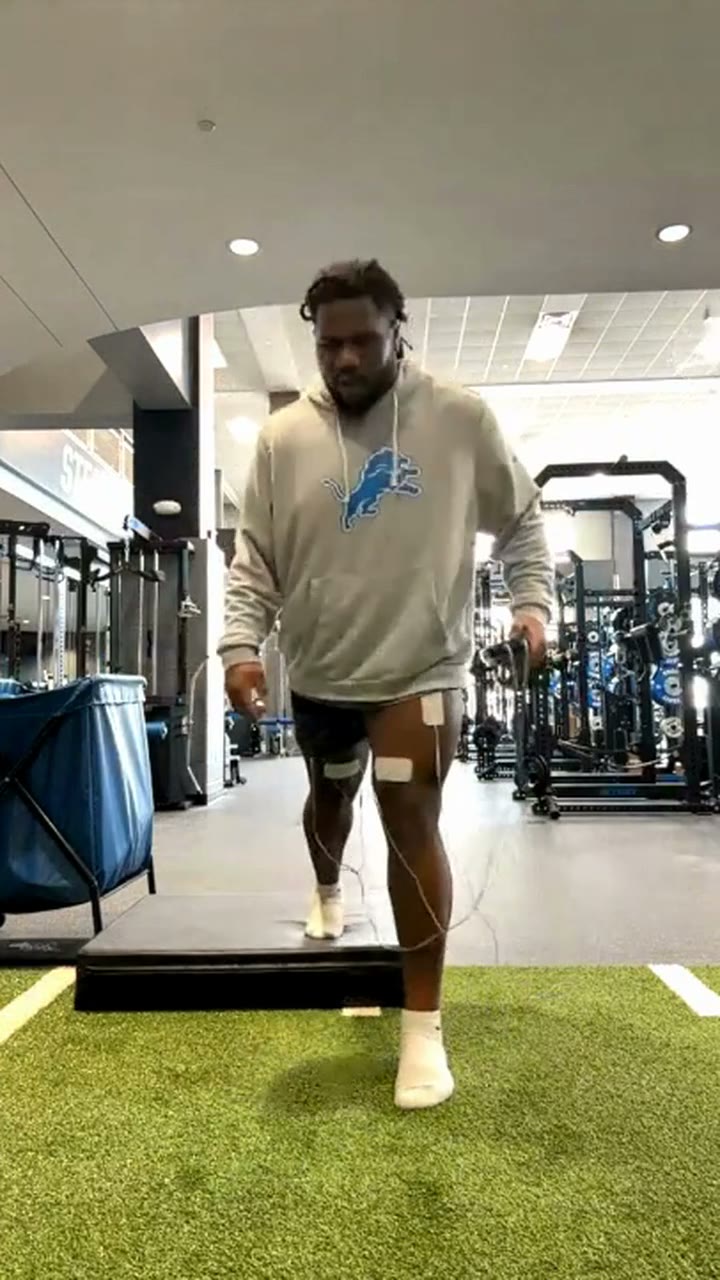 Alim McNeill, Detroit Lions defensive tackle, in a one-on-one virtual session with NS1 pads on his leg